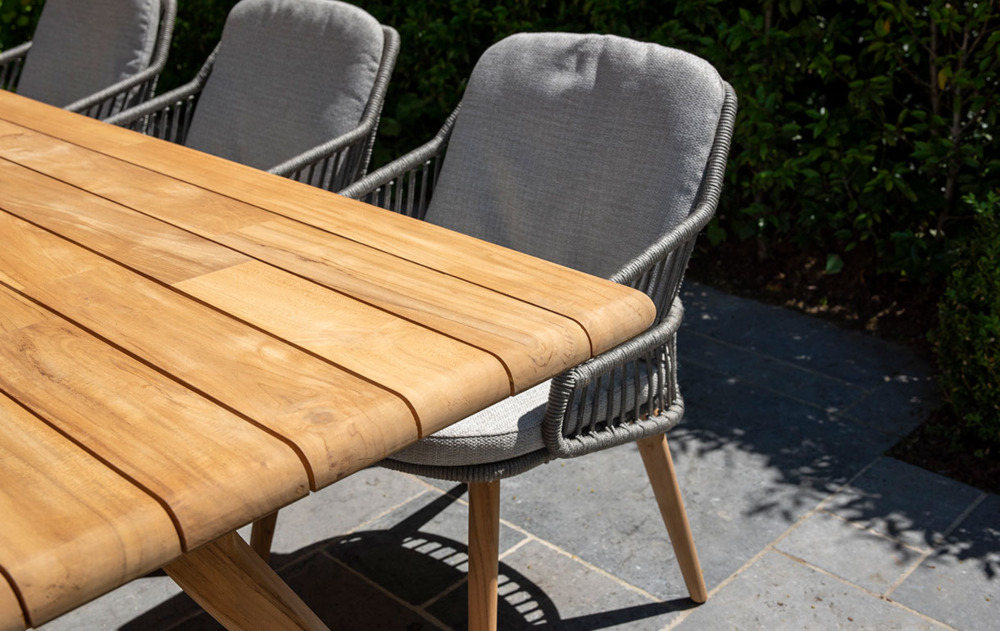 Teak garden dining table with rope dining chairs